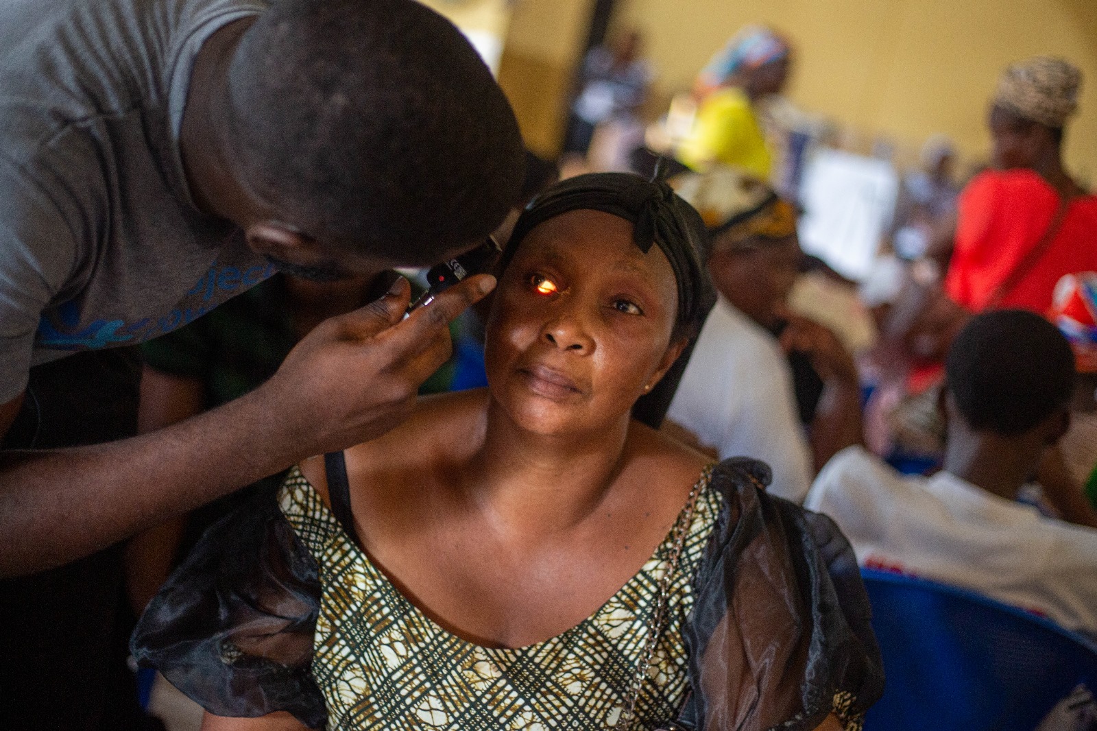 Retinal examination with ophthalmoscope